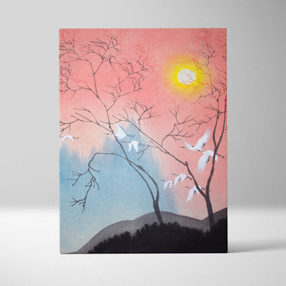 A rectangular pink blue crane canvas wall art with black trees white birds and a glowing yellow sun in japanese ink style