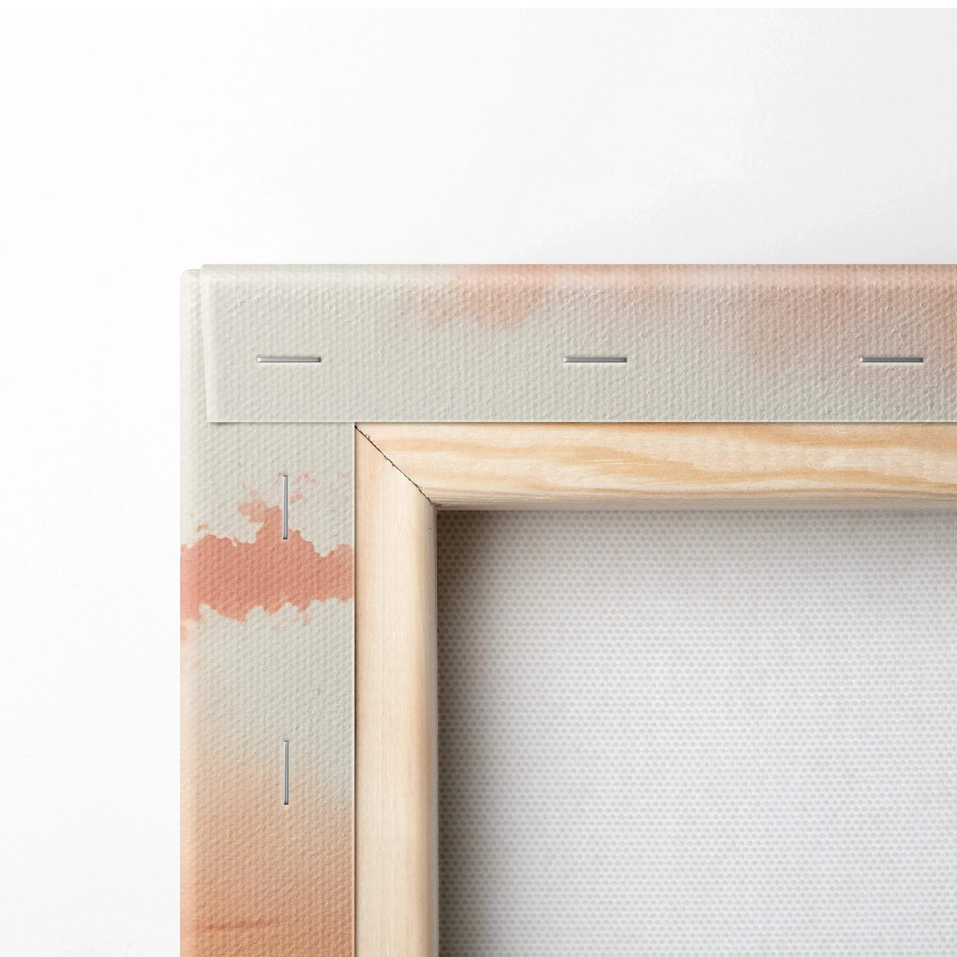 Minimalist wooden canvas frame with light natural wood finish and pinkish orange paint splatters for golden hour sunset landscape wall art