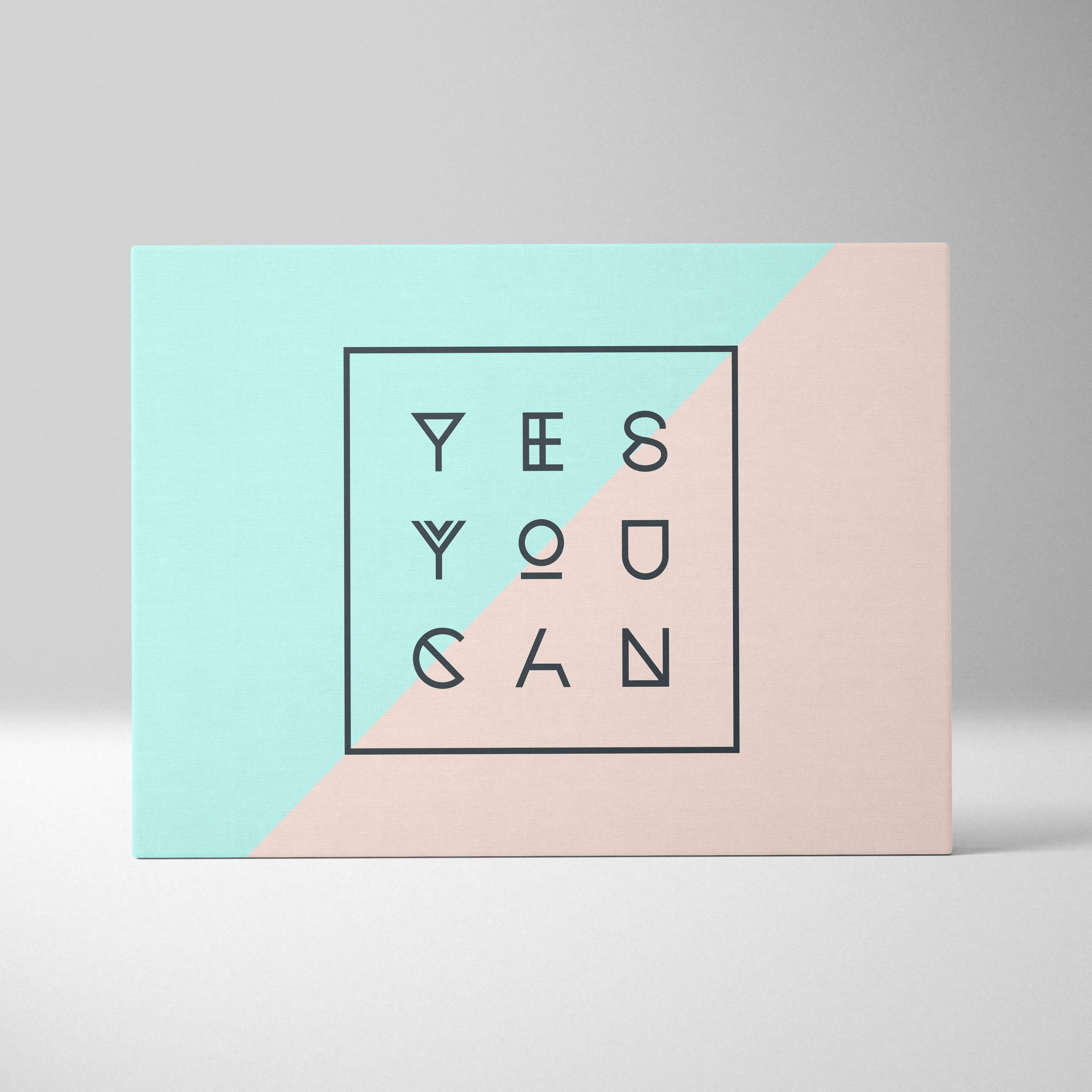 Motivational yes you can canvas wall art with bold black geometric typography on mint green and blush pink split background