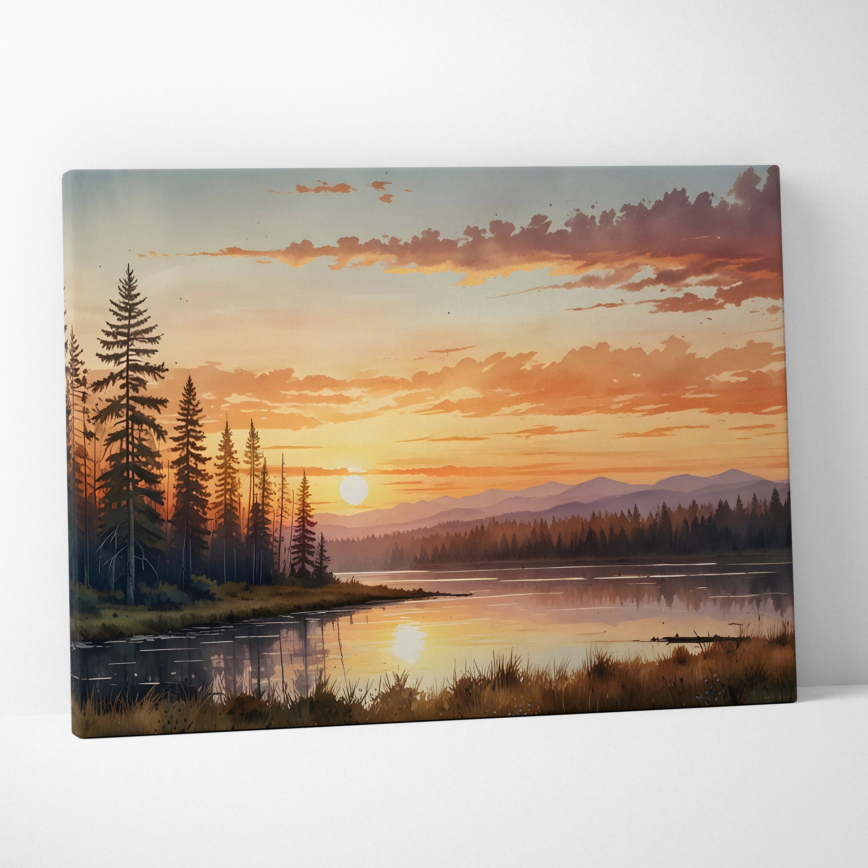 Canvas wall art featuring a golden sunset over mountain range with trees and reflective water.