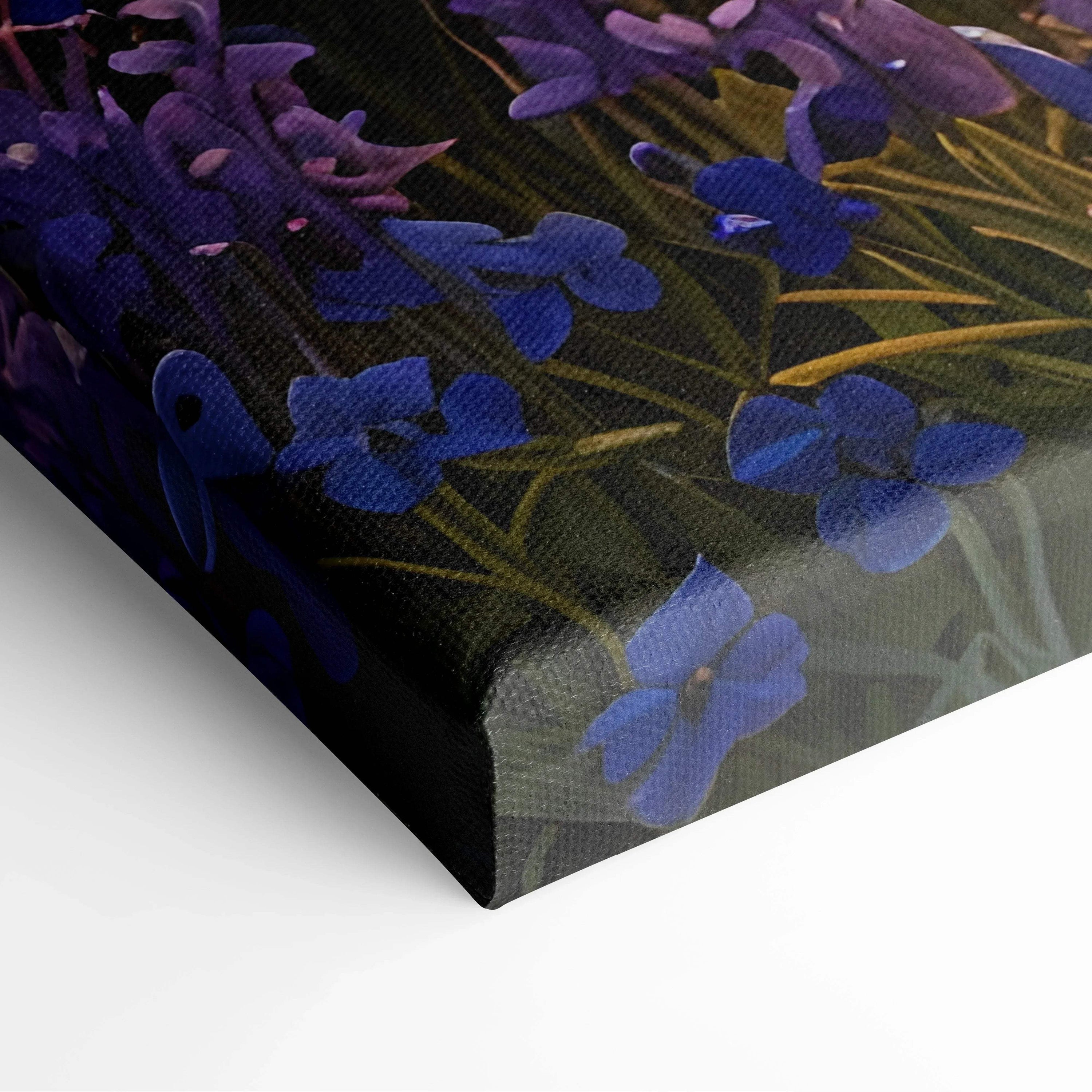 Close-up of vibrant purple floral watercolor on textured canvas wall art corner.