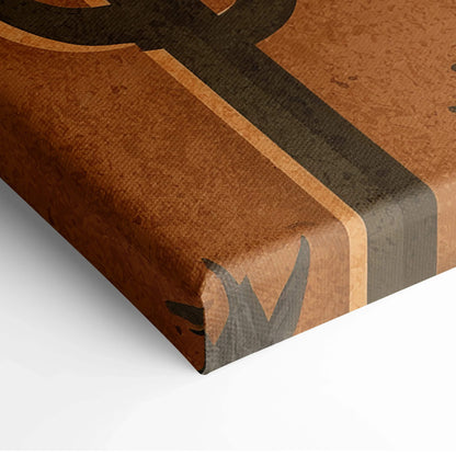 Close-up of desert landscape canvas wall art with warm brown and black geometric design details.
