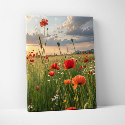 Vibrant floral sunset canvas wall art featuring red poppies and green grass under a glowing sky.