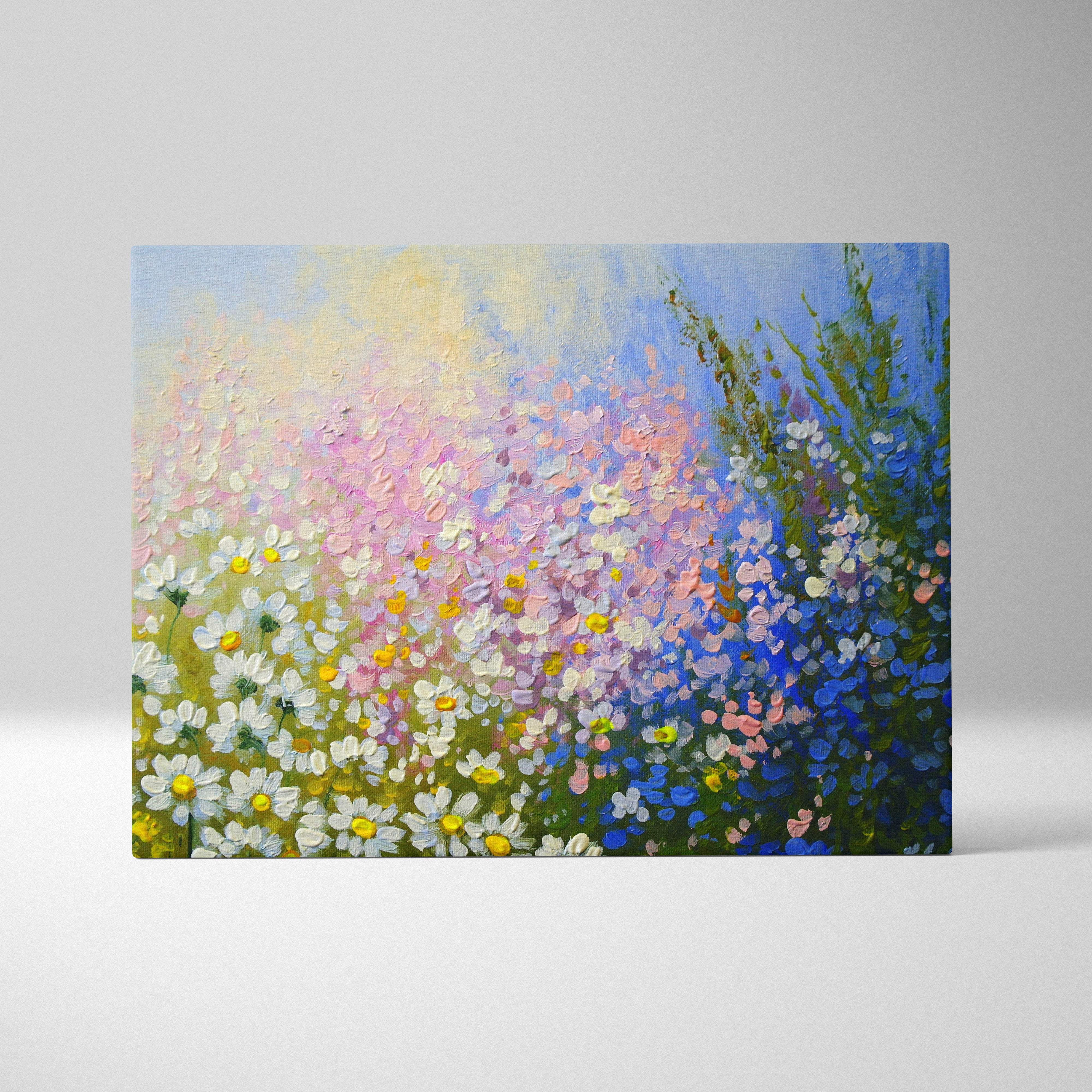 Wildflower meadow painting style wall art featuring a pastel field of daisies and wildflowers on textured canvas