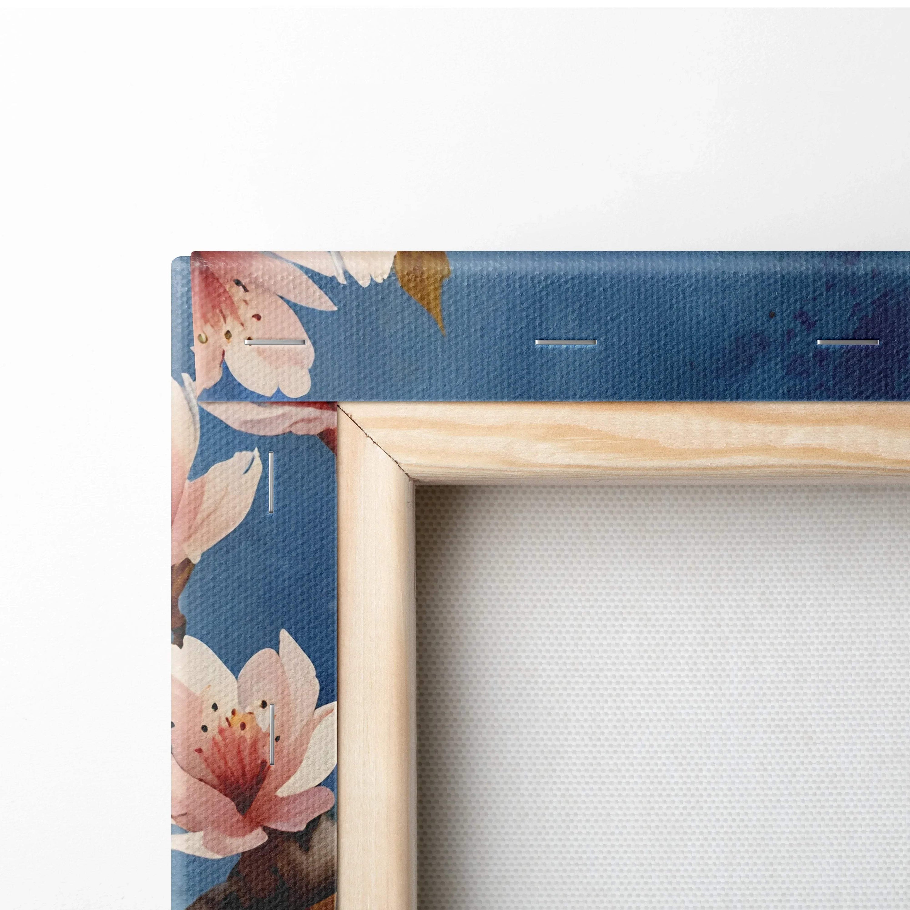 Cherry blossom floral design on blue canvas corner with natural wood frame wall art.