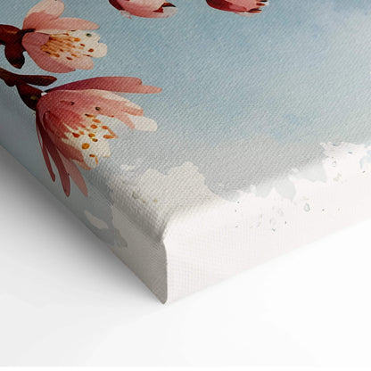Canvas wall art featuring delicate pink cherry blossoms against a soft blue sky background.