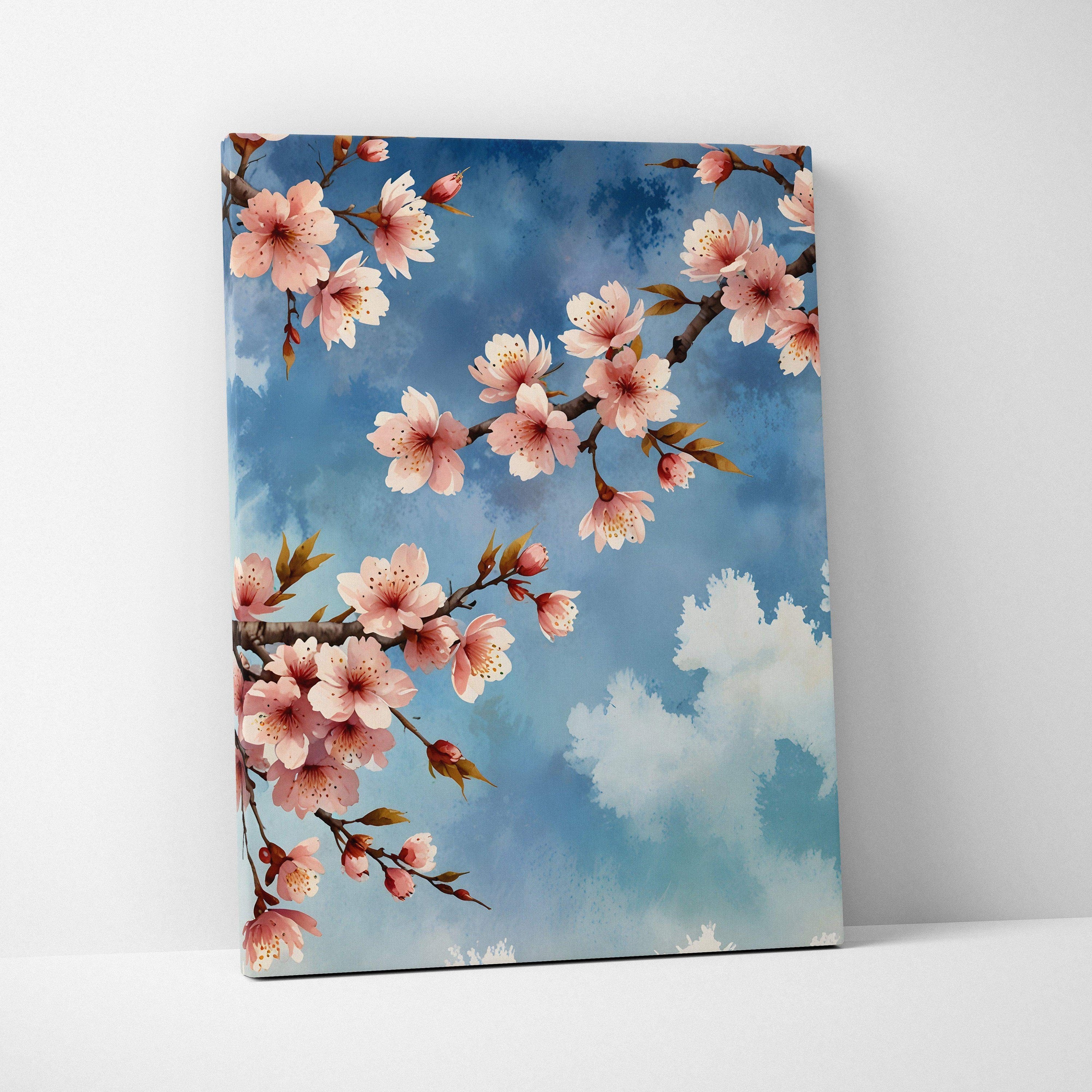 Canvas wall art featuring vibrant cherry blossom branches against a blue sky with soft clouds.