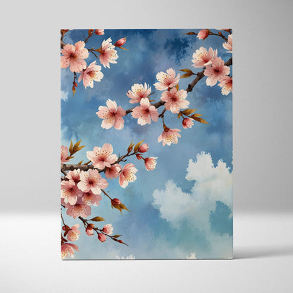 Canvas wall art featuring vibrant cherry blossom branches against a blue sky with soft clouds.