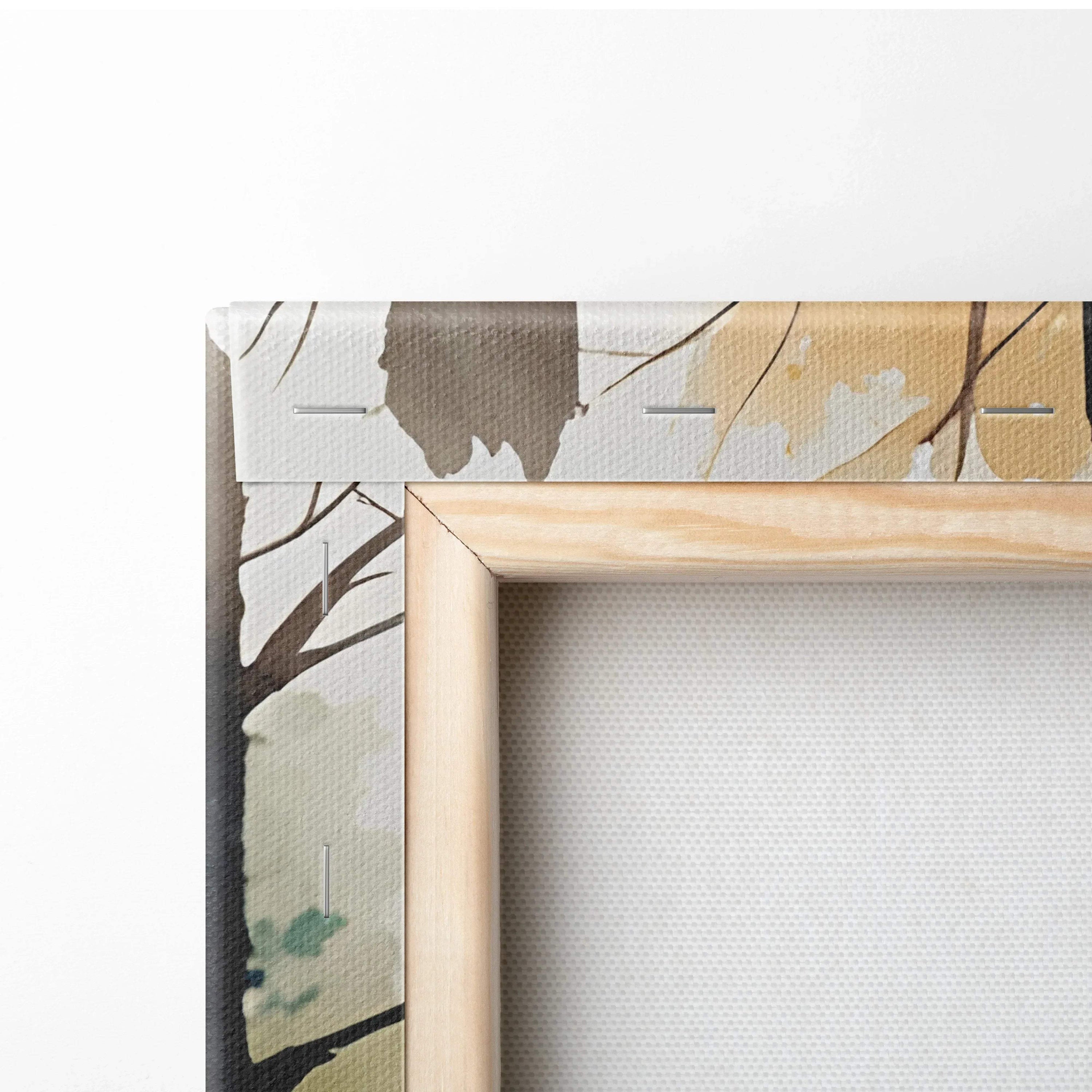 Corner close-up of canvas wall art with autumn forest watercolor and natural wood frame.