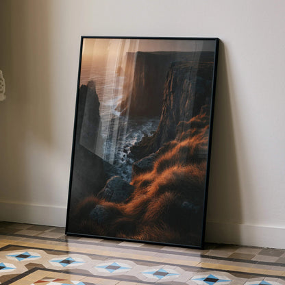 Vertical sunset nature poster featuring glowing orange grass and rugged cliff wall art.