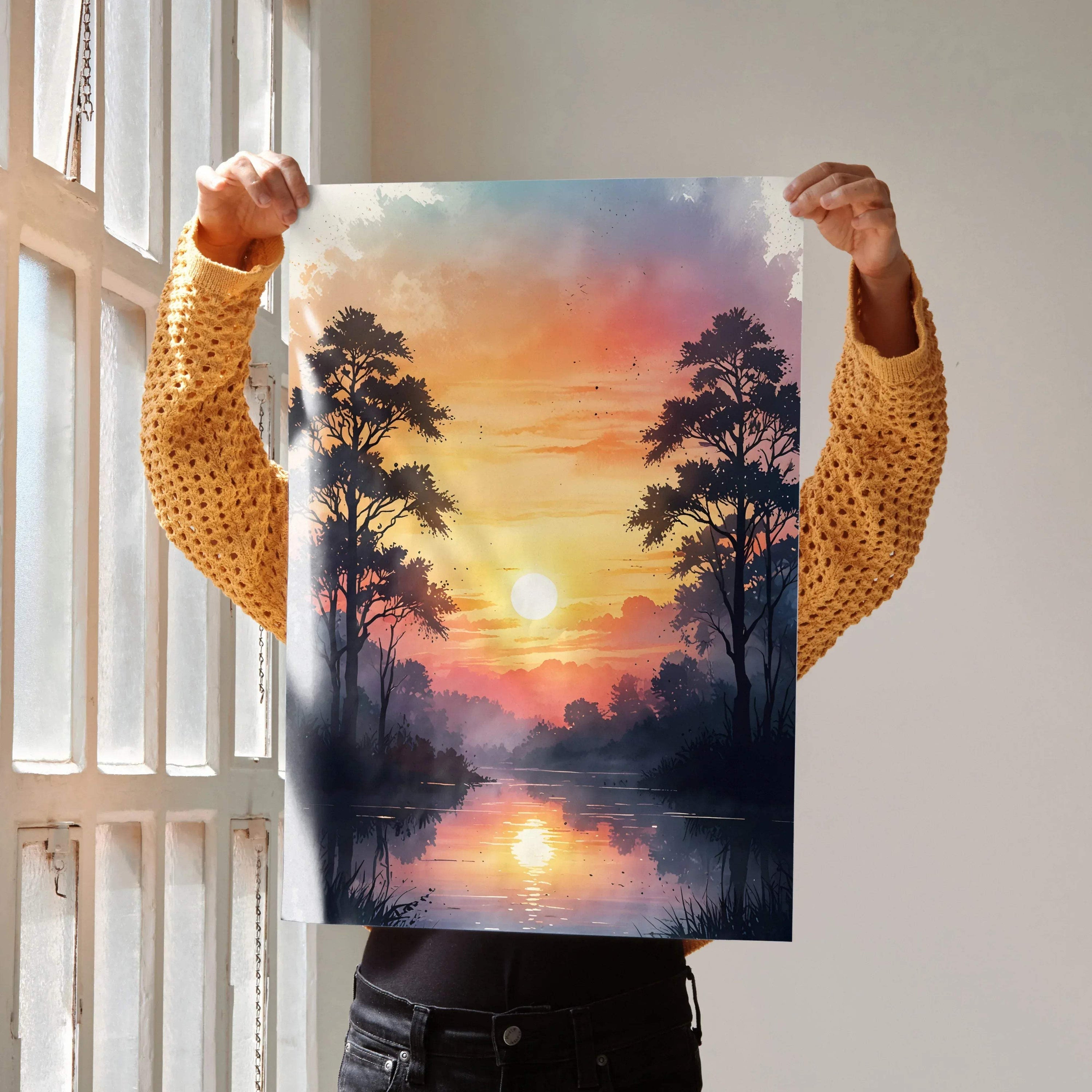 Vertical watercolor sunset nature wall art poster with silhouetted trees and reflective water.
