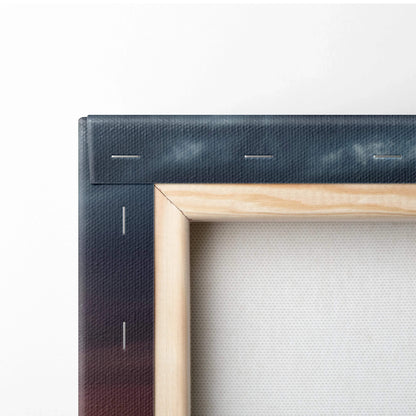 Close-up of wooden frame and stitched black canvas backing on wall art print.