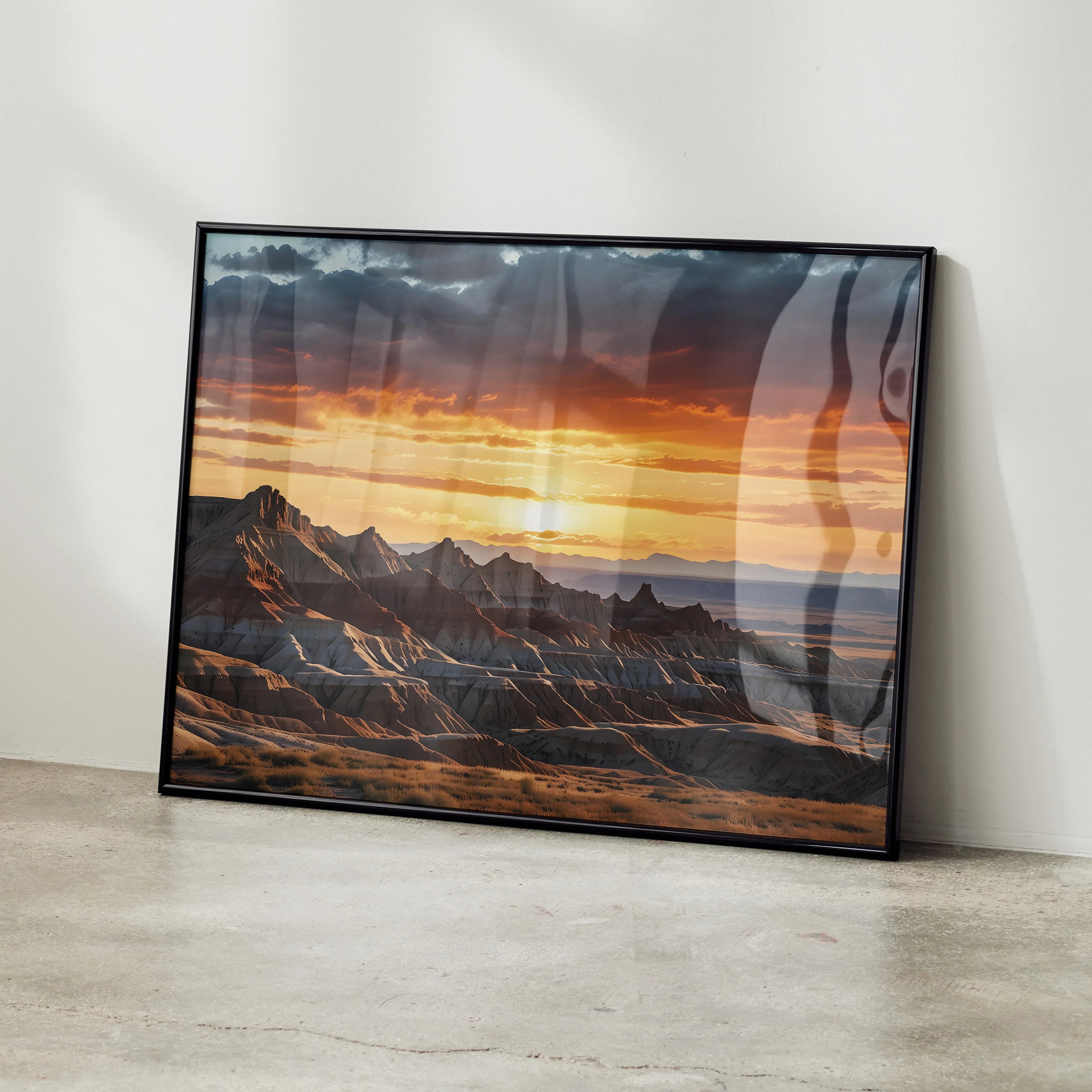 Vibrant watercolor sunset mountains poster with rich orange sky and layered peaks wall art.