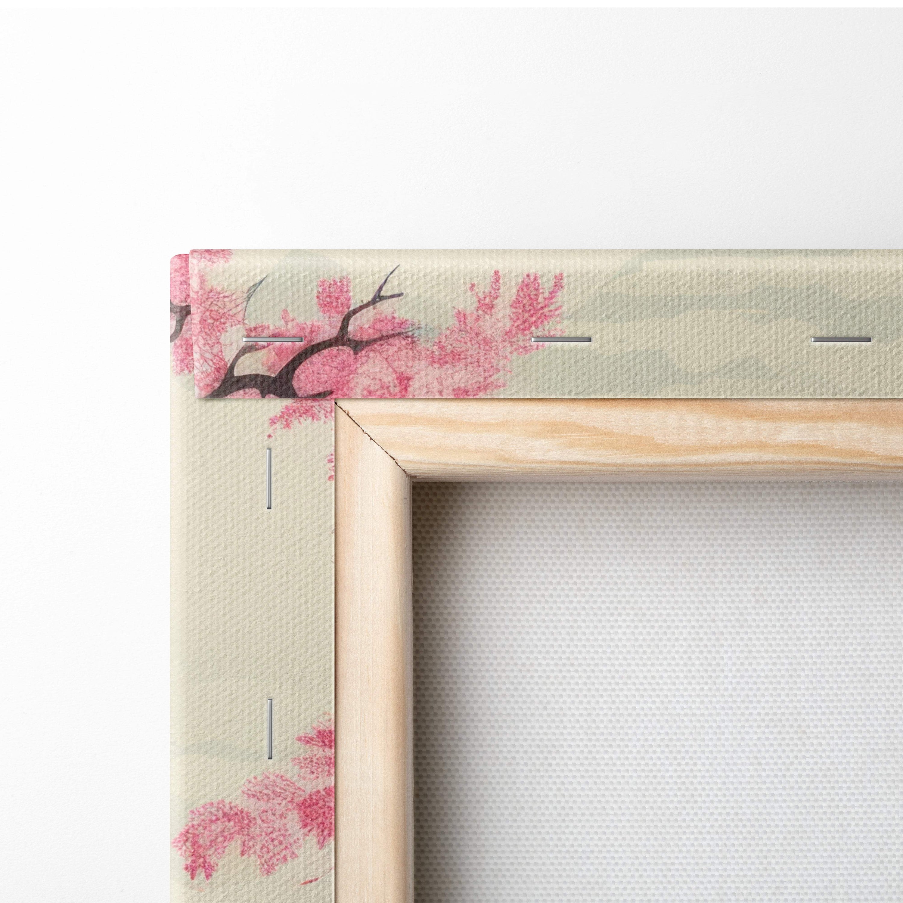 Pink mount fuji canvas wall art with light wood frame and delicate pink cherry blossom pattern on beige border