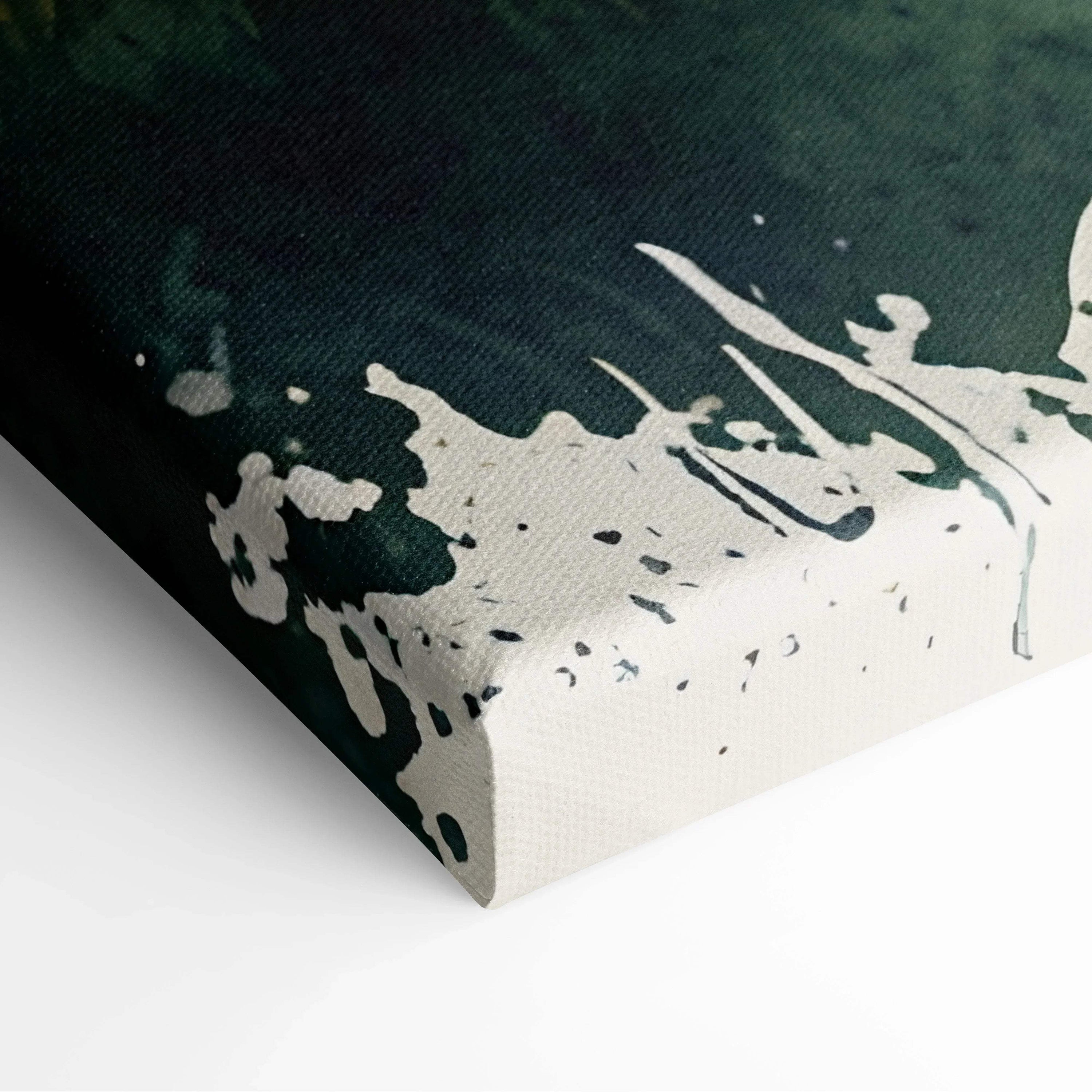 Close-up of canvas corner with dark green and white watercolor paint, textured wall art surface.
