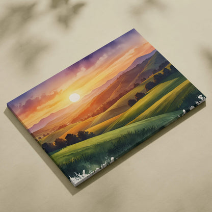 Watercolor canvas wall art featuring vibrant sunset over rolling green mountains with soft purple sky.