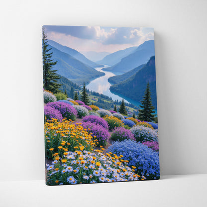 Canvas wall art featuring vibrant wildflowers in purple, yellow, and white blooming on a mountainside with a winding river.