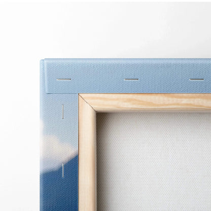 Close-up of vibrant floral canvas wall art print with wooden stretcher frame and secured staples.