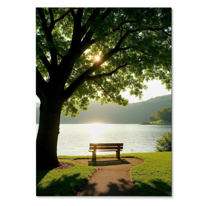 Vertical nature wall art poster featuring a sunlit tree beside a lakeside bench.