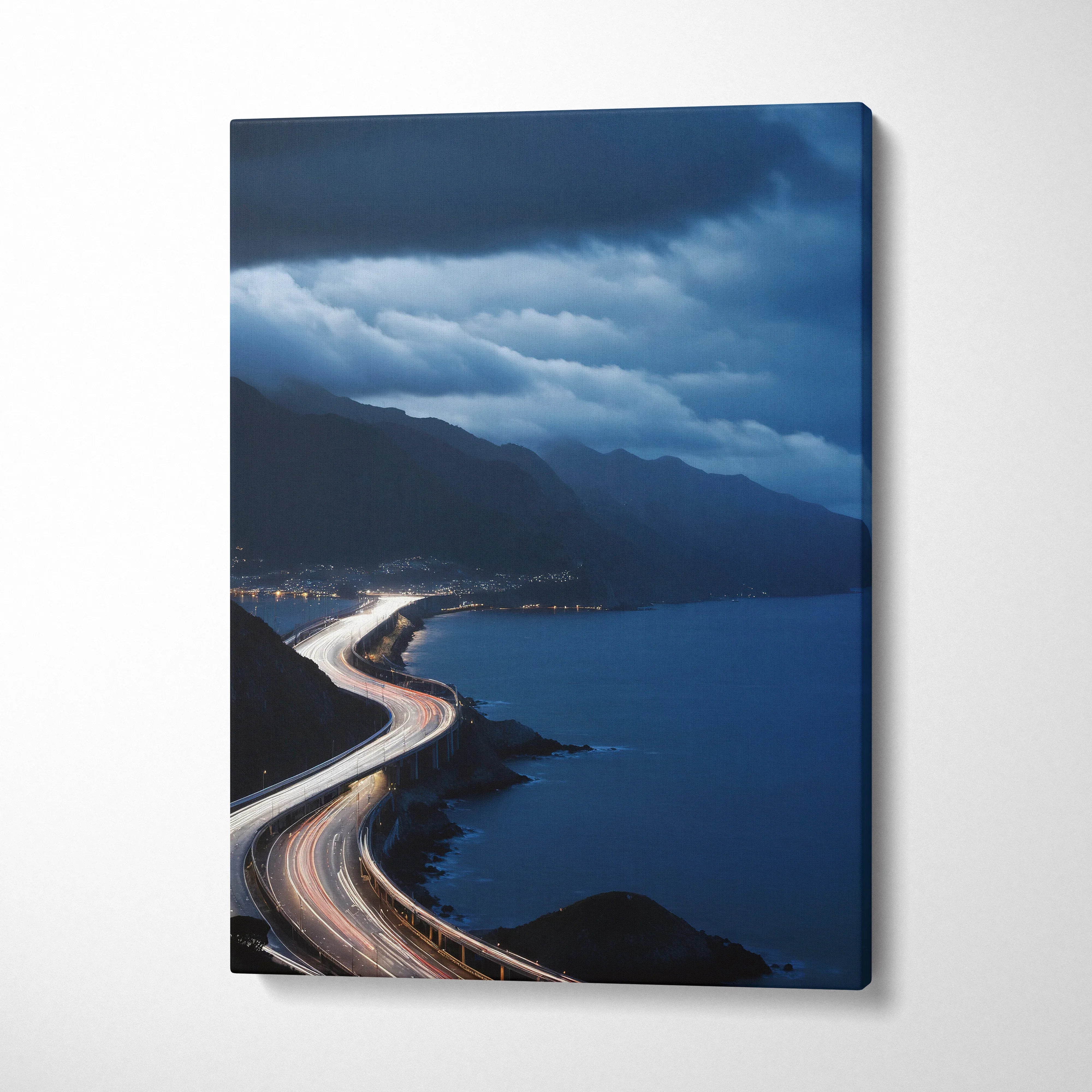 Vertical canvas wall art featuring a vibrant city night sky with illuminated highways and mountain silhouette.