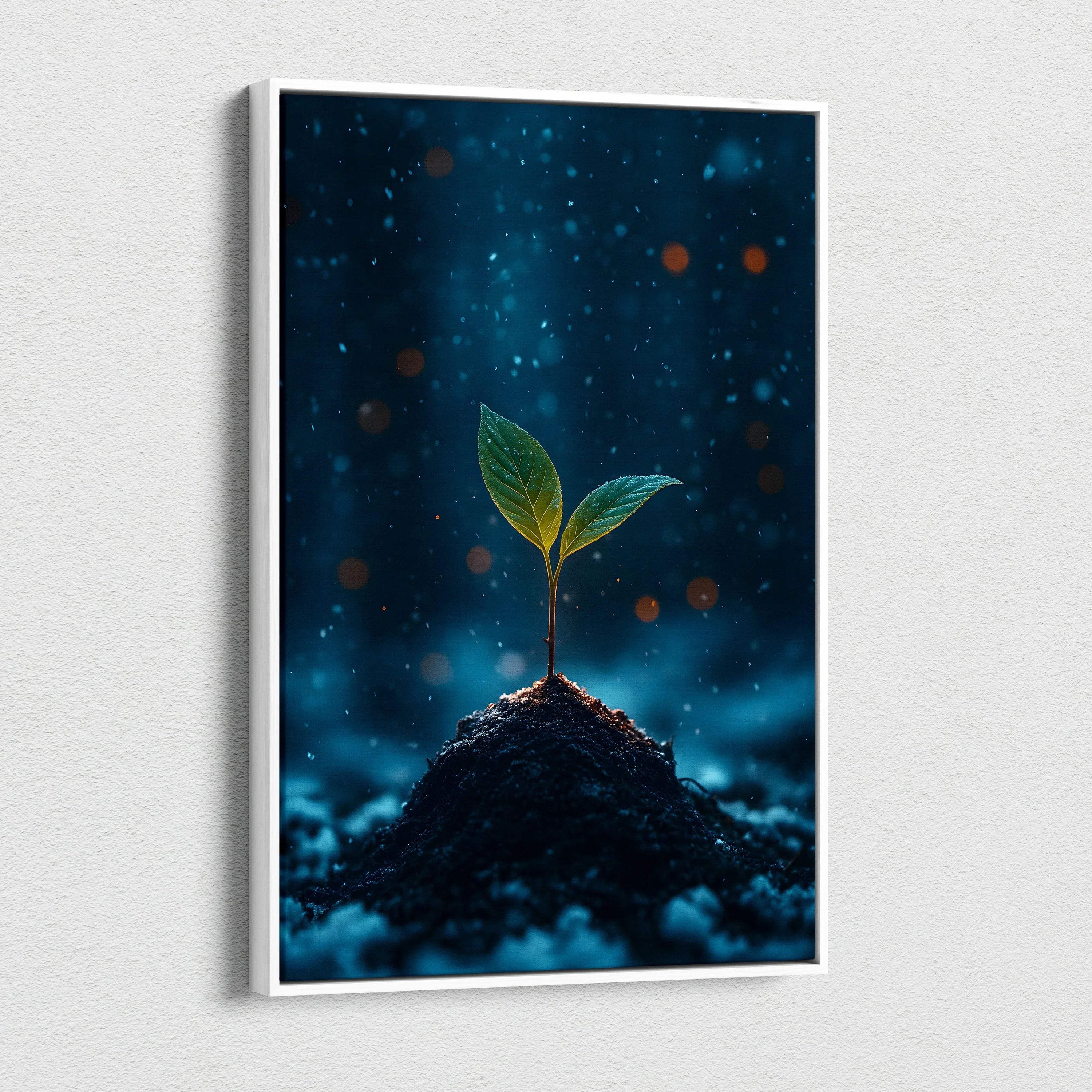 Canvas wall art featuring a small green seedling sprouting from dark soil against a deep blue background.