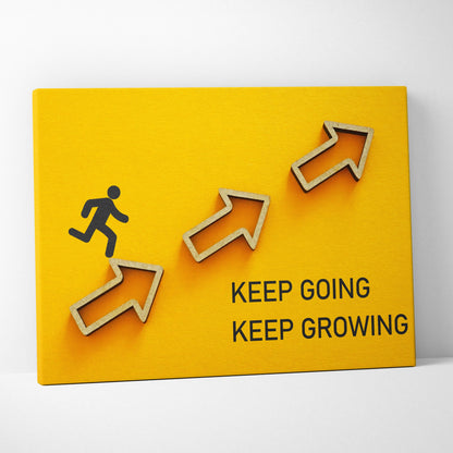 Bright yellow canvas wall art with 3D wooden arrows and a black running silhouette featuring keep going keep growing text