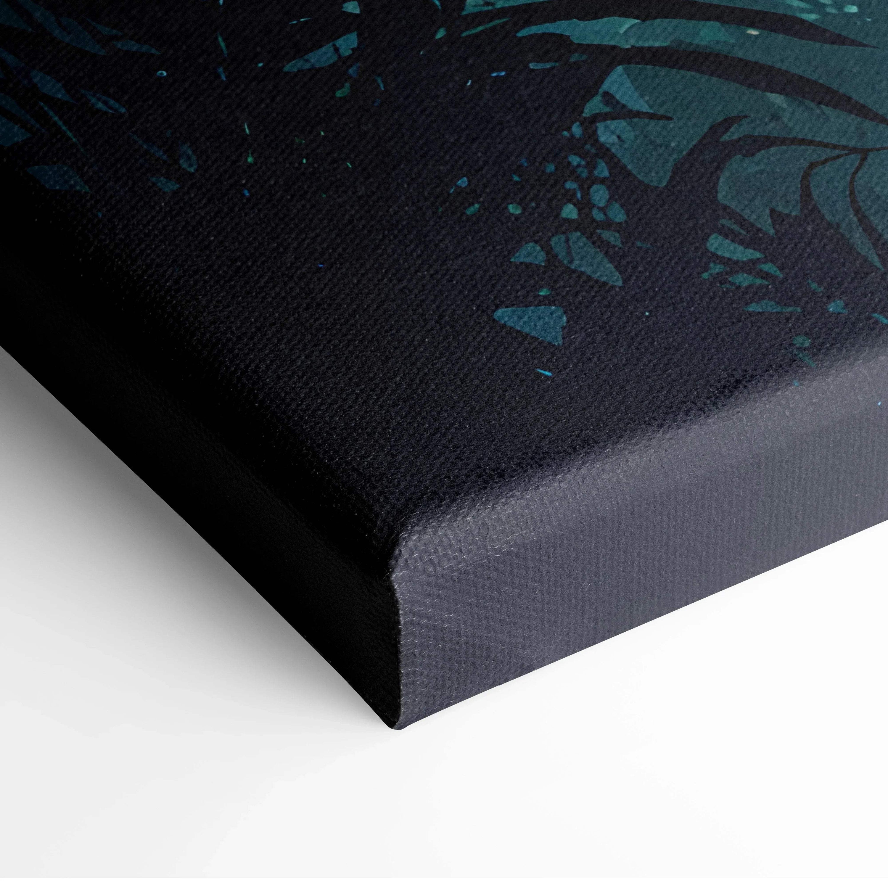 Close-up of dark forest-themed canvas wall art with deep blue and black tones.