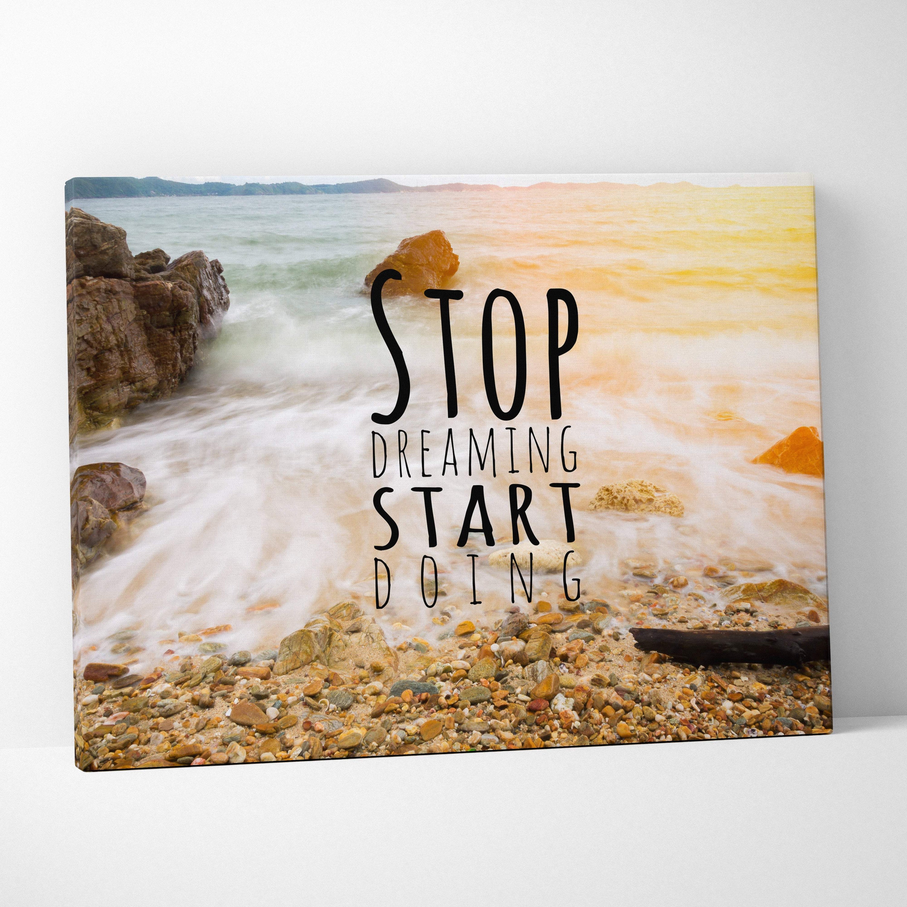 Rectangular canvas print of a beach scene with waves and rocks featuring motivational black text for coastal decor