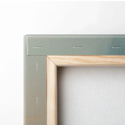 Close-up of wooden frame and stapled beige canvas backing for wall art canvas.