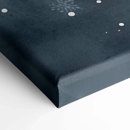 Close-up of black canvas wall art corner with white dots and textured fabric surface.
