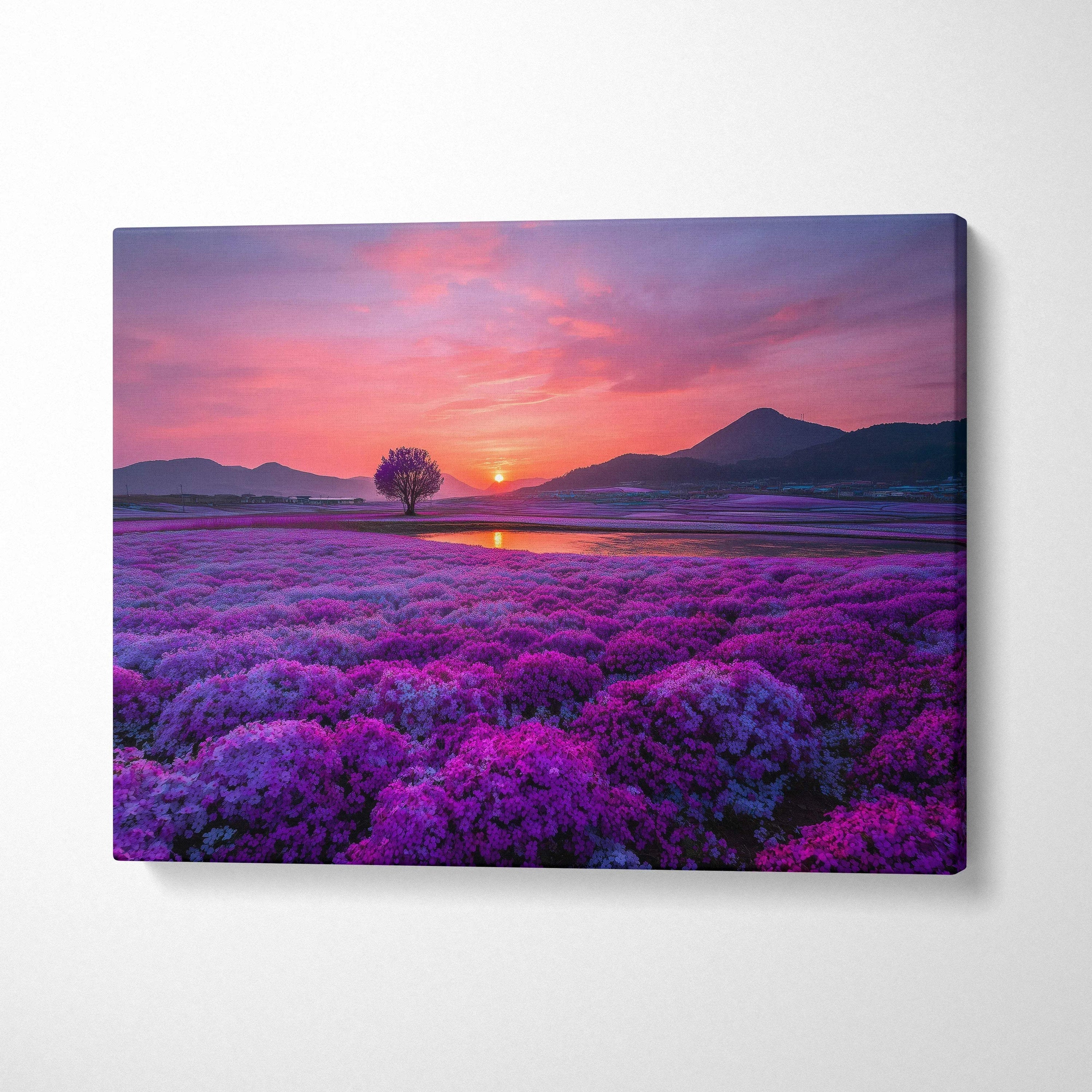 Canvas wall art featuring vibrant purple floral field at sunset with silhouetted tree and mountains.