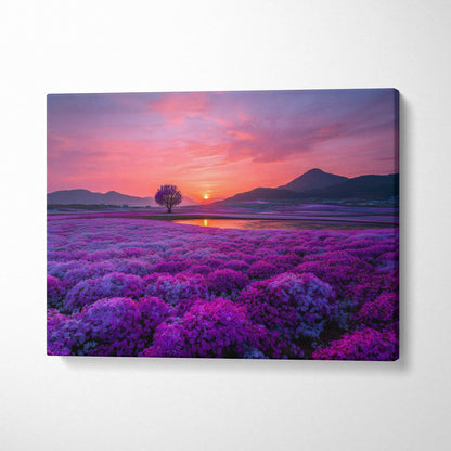 Canvas wall art featuring vibrant purple floral field at sunset with silhouetted tree and mountains.