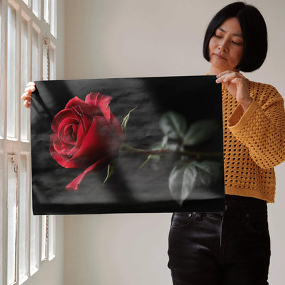 Vibrant red rose floral digital art poster with dark background held as wall art.