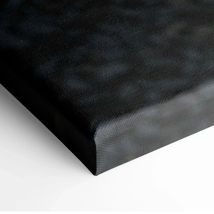 Black textured canvas corner close-up showing fine weave detail for wall art.