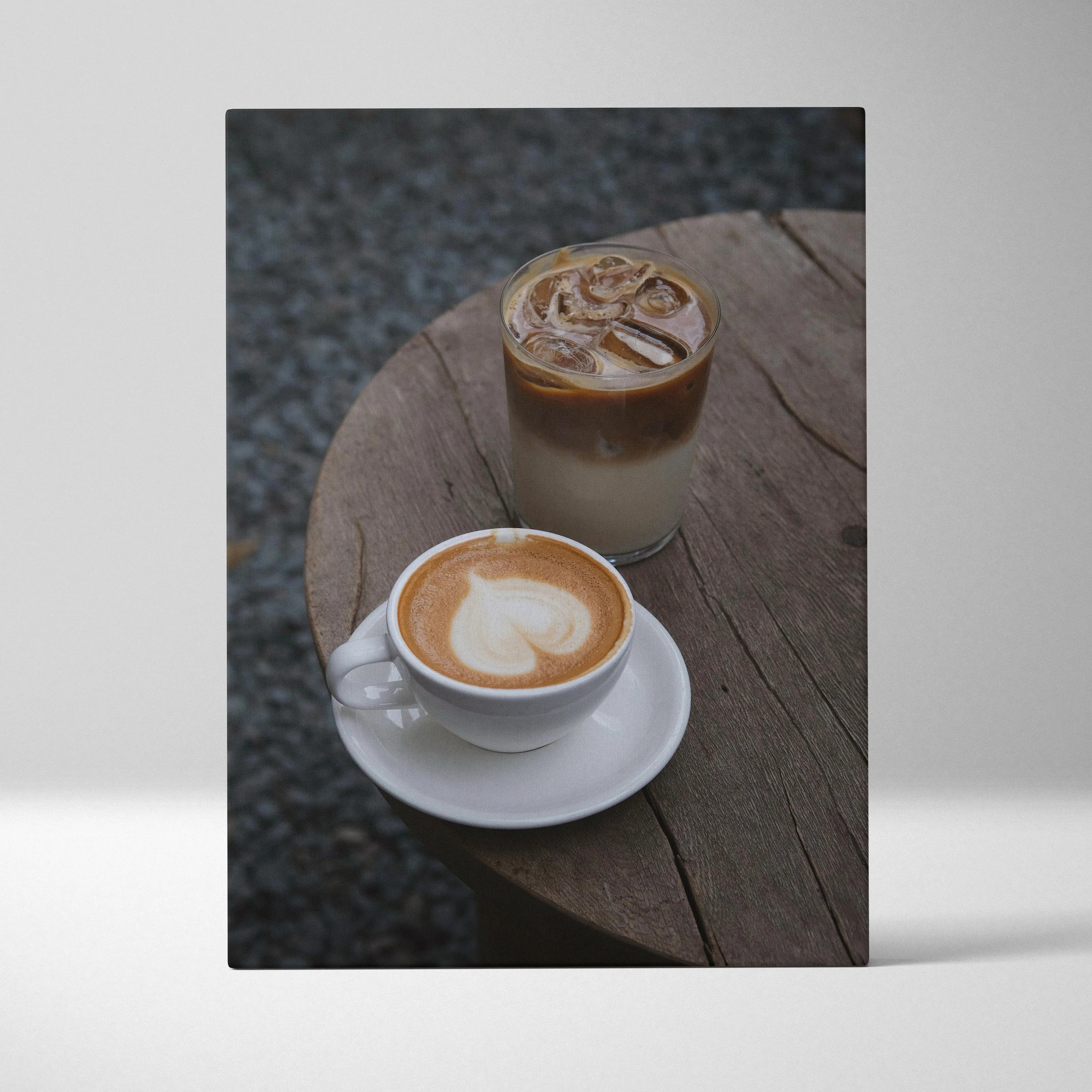 Coffee-themed digital art canvas wall print featuring iced and hot coffee on rustic wooden table.