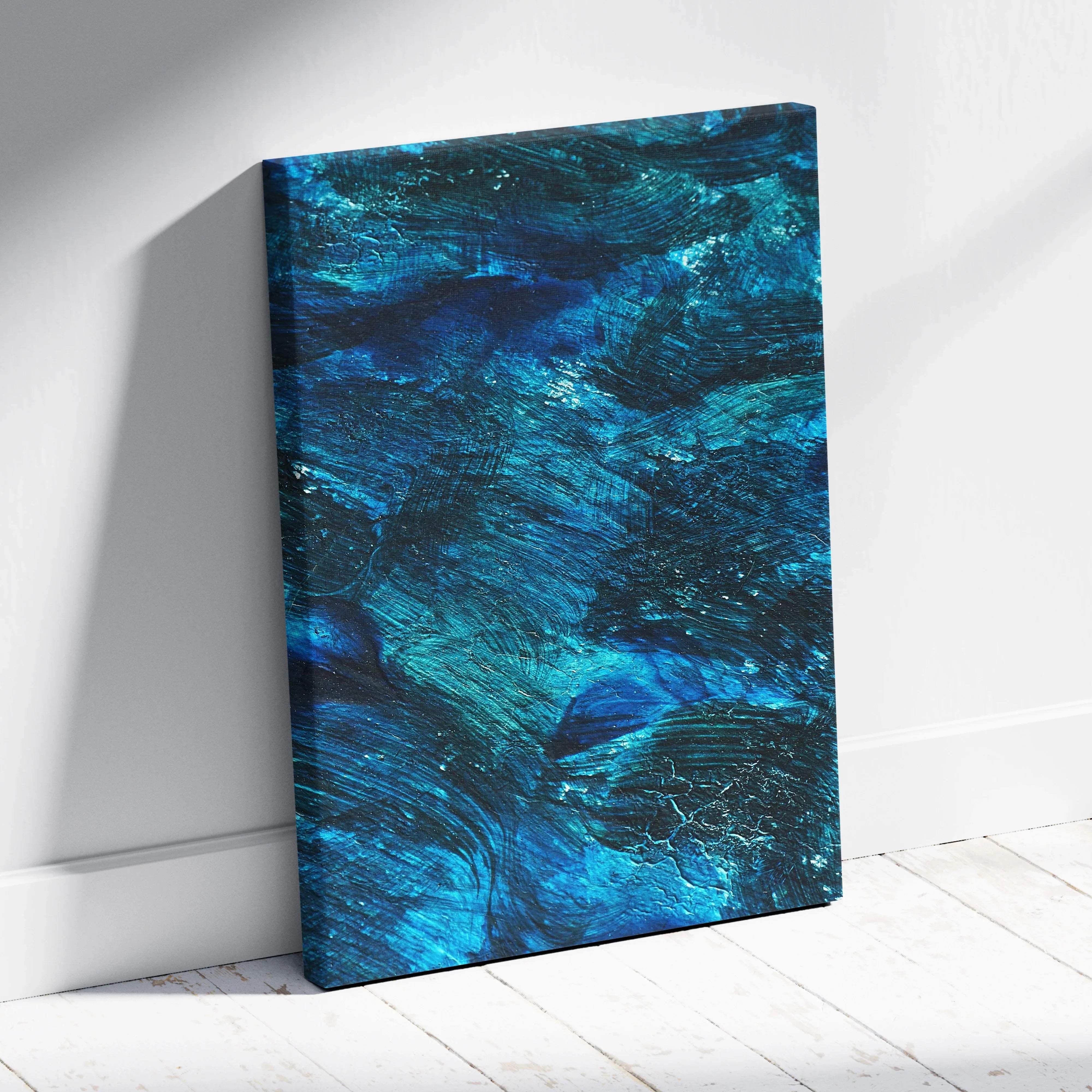 A vibrant blue abstract canvas wall art with textured brushstrokes and deep navy accents for a calm serene mood