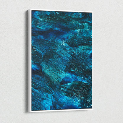 Vertical abstract nature-inspired canvas wall art in deep blue and teal tones with textured brushstrokes.