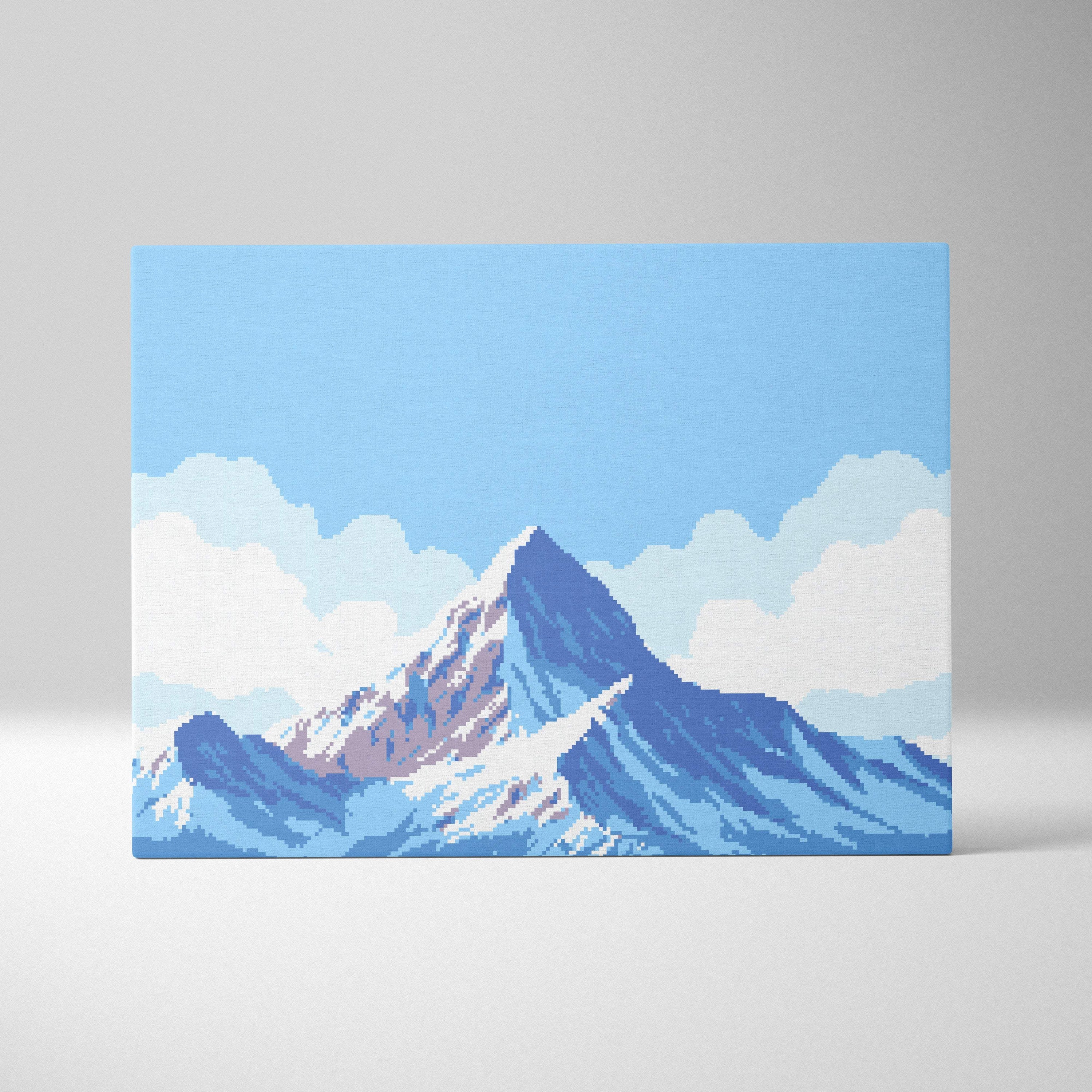Snowy mountain pixel art canvas print featuring a blue alpine landscape with a snow-capped peak under soft clouds