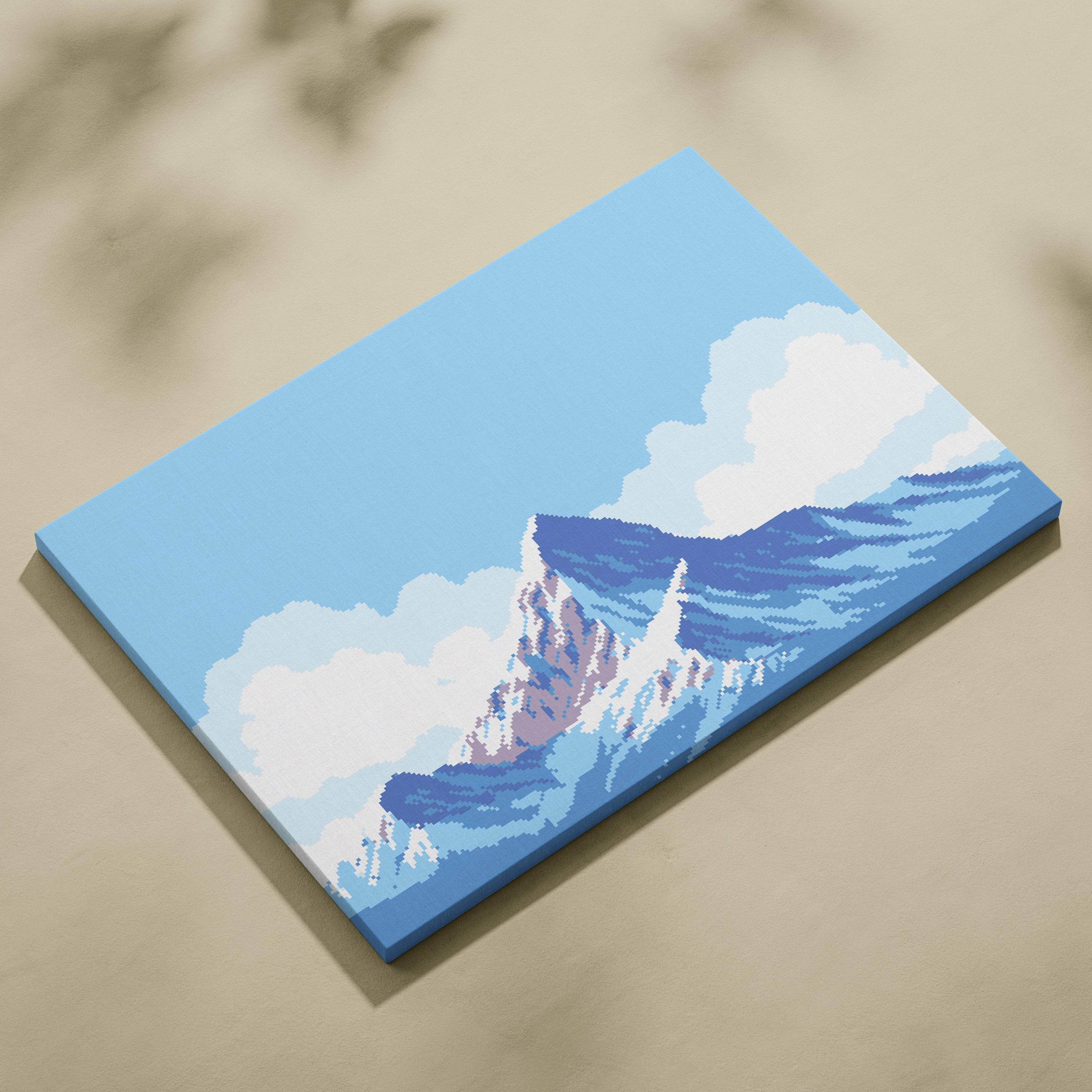 Rectangular canvas print of pixelated snowy mountain landscape with blue and white peaks under a light blue sky
