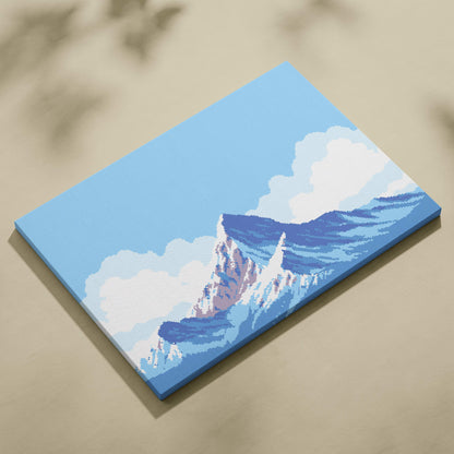 Rectangular canvas print of pixelated snowy mountain landscape with blue and white peaks under a light blue sky