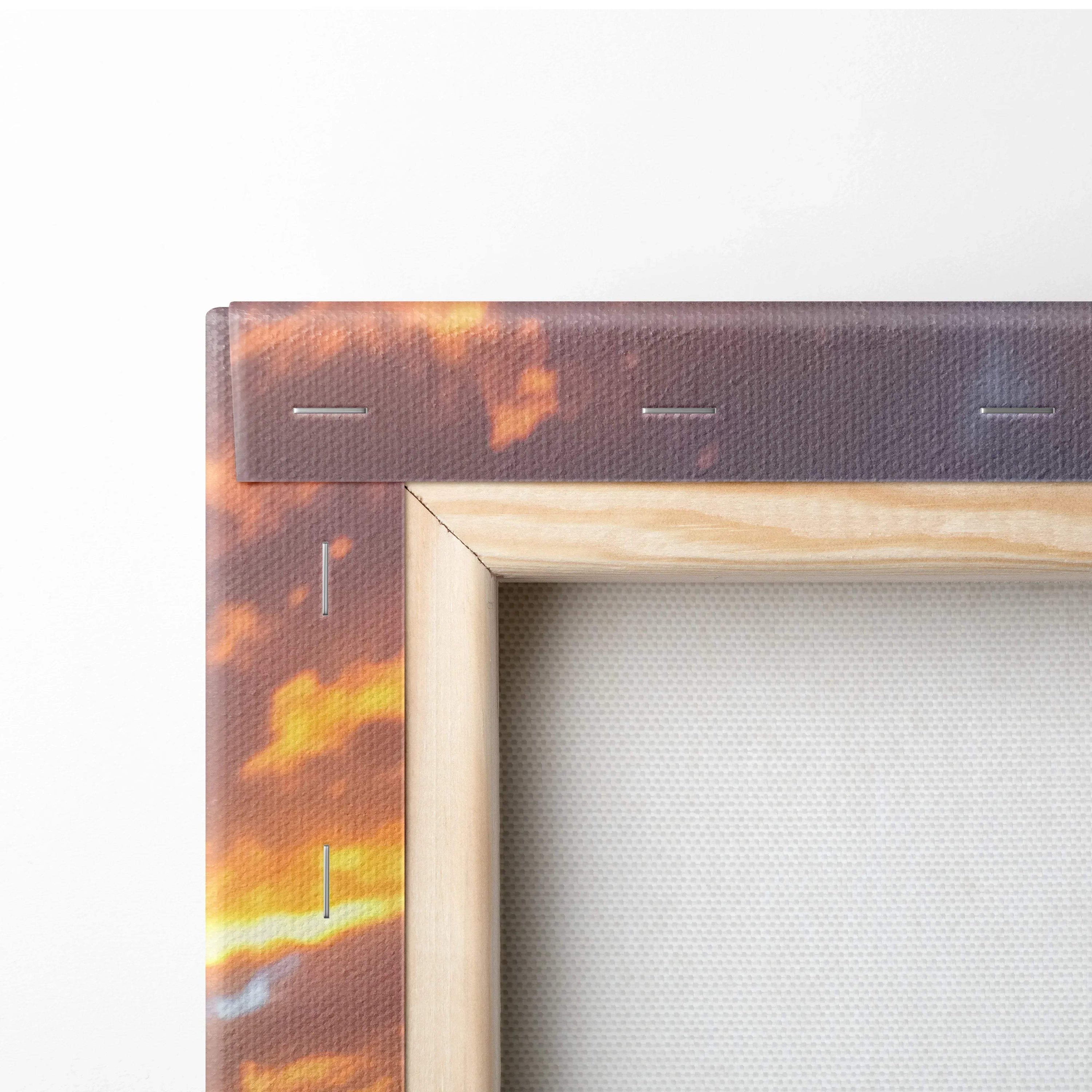 Close-up of wooden frame corner and canvas texture on vertical wall art print.