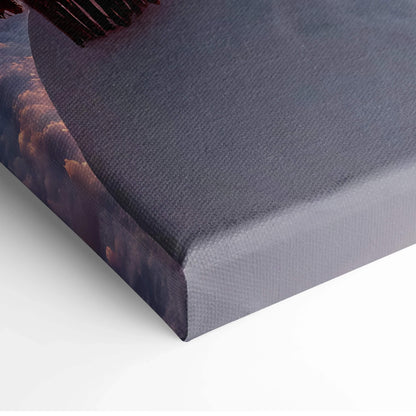 Corner close-up of wrapped canvas wall art with serene snowy landscape and soft purple hues.