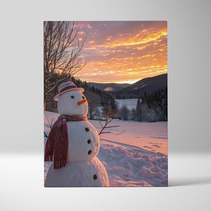 Canvas wall art featuring a snowman with a red scarf at sunset over a snowy landscape.