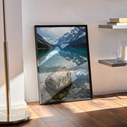 Majestic mountain landscape poster with reflective lake and large rock, vertical wall art.