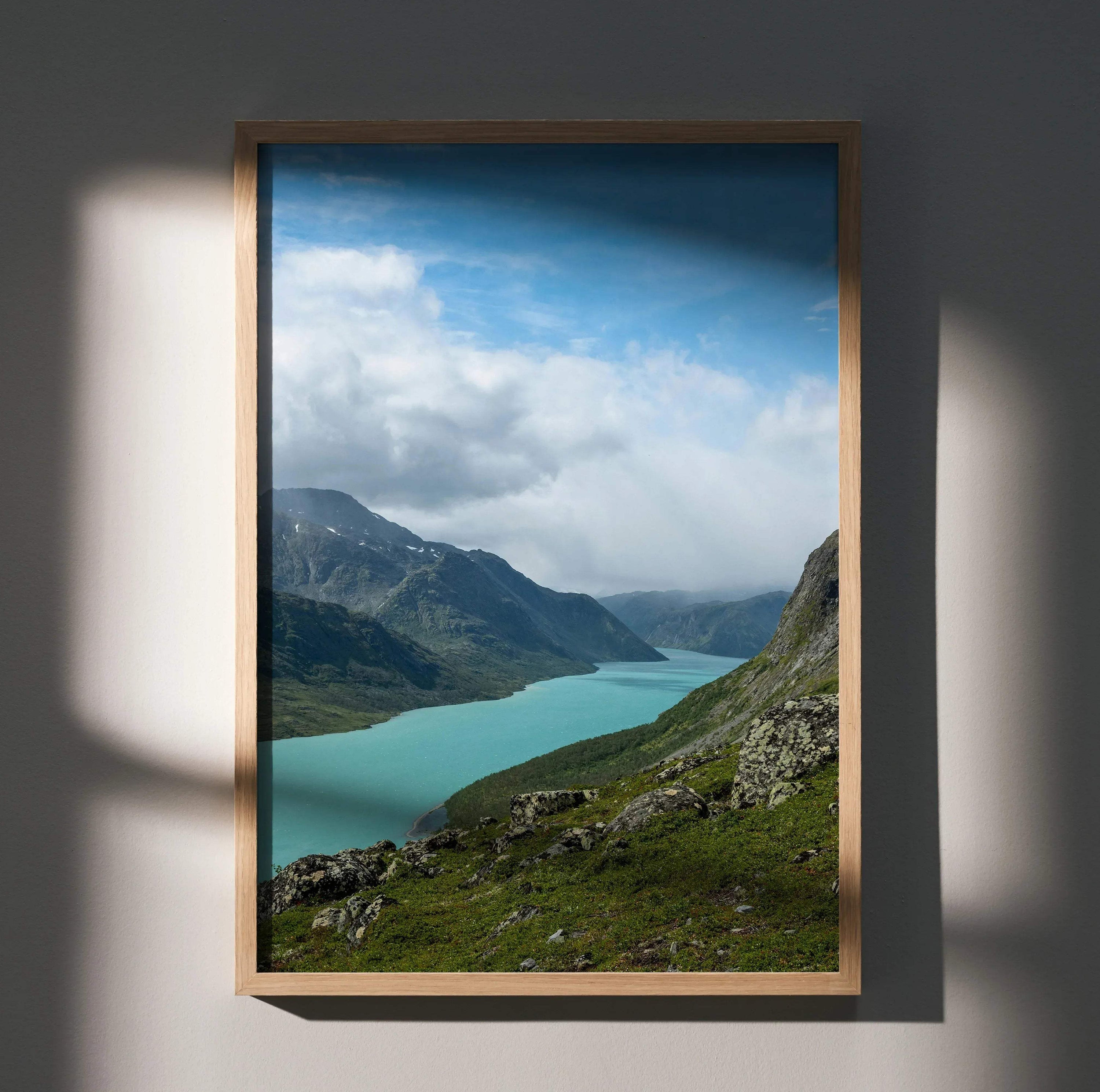 Vertical wall art poster of a majestic mountain landscape with turquoise lake under a blue sky.