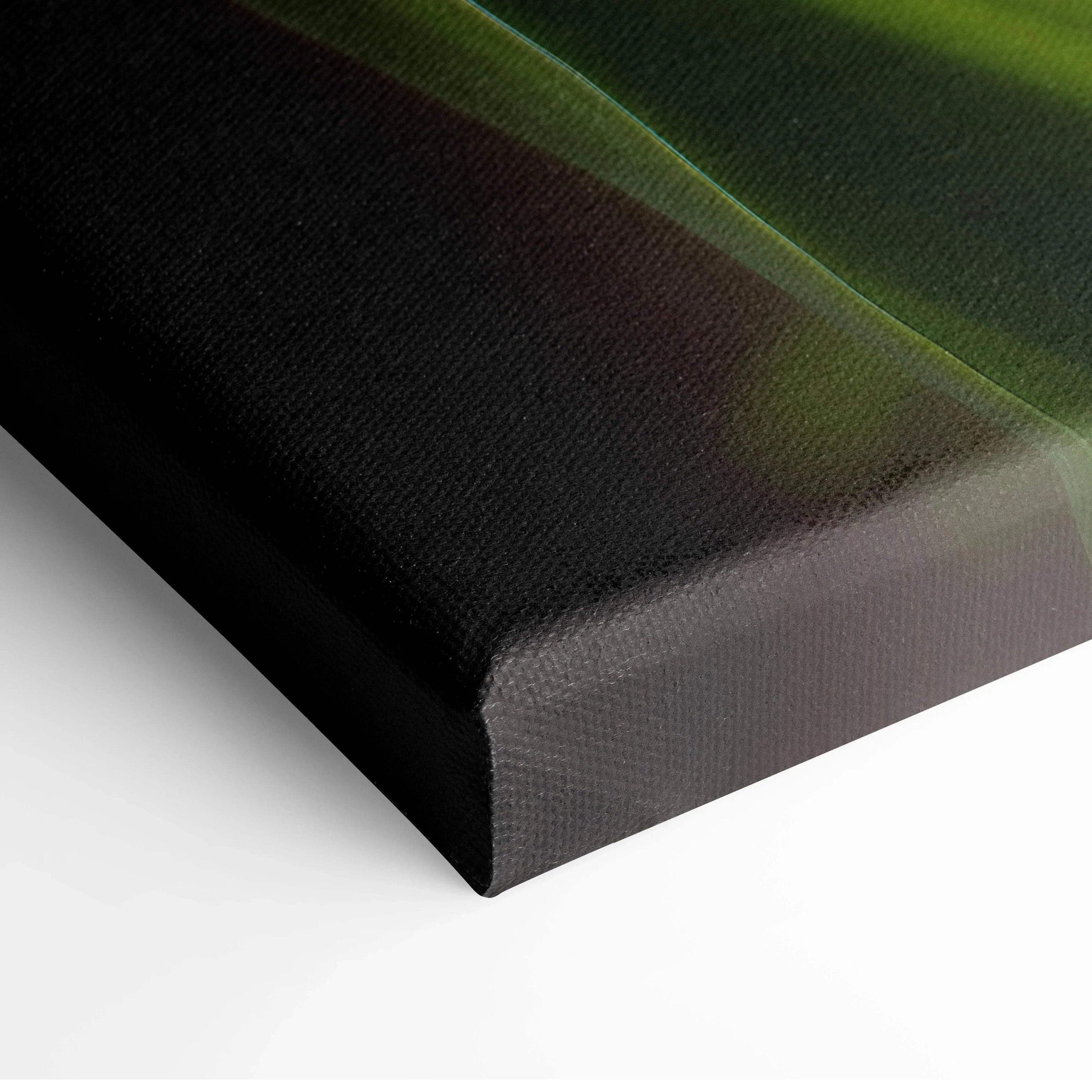 Close-up of floral-themed canvas wall art with dark background and green accents.