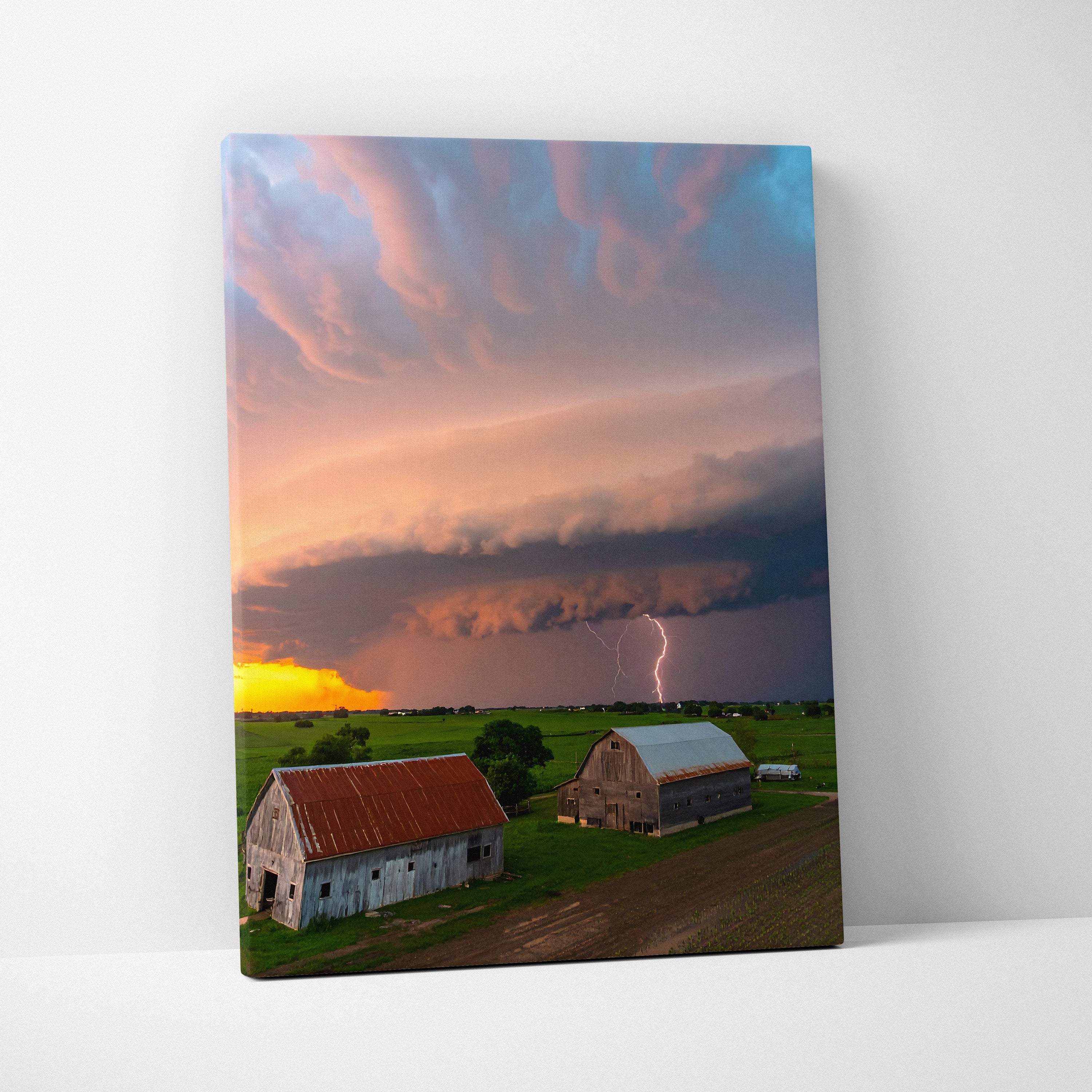 Lightning storm over farm canvas print with vibrant pink orange and purple clouds for rustic home decor