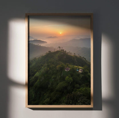Vertical sunset nature poster with misty green hills and warm orange sky wall art.