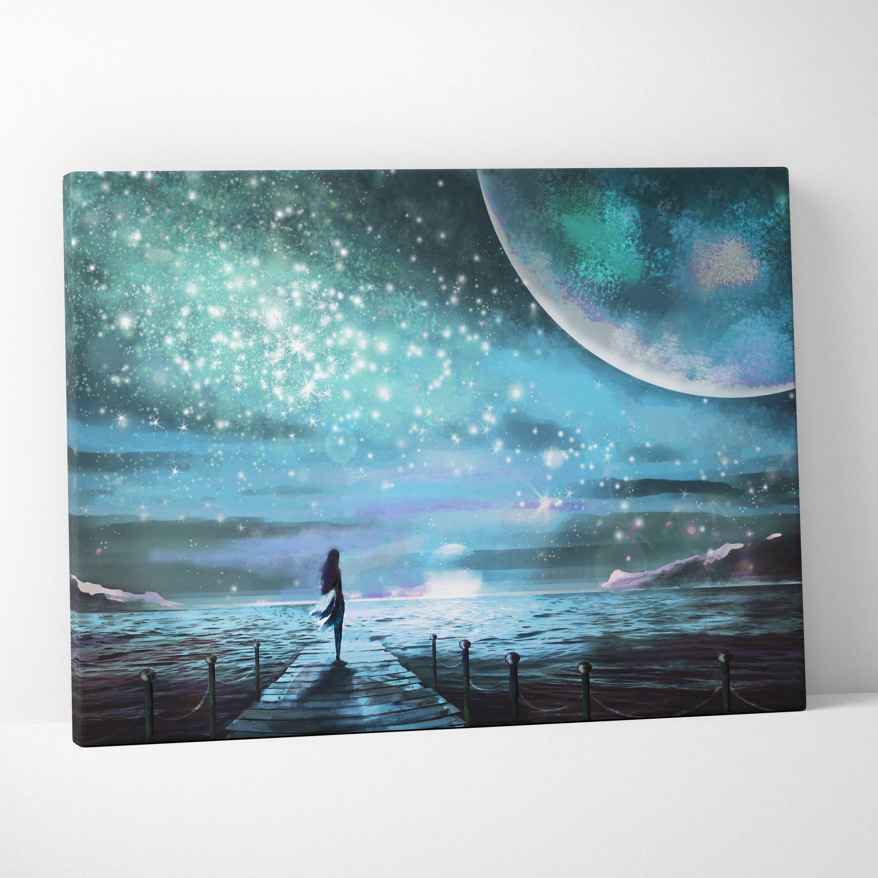 Dreamy night sky seascape canvas print featuring a teal and blue moon with a lone figure on a wooden pier