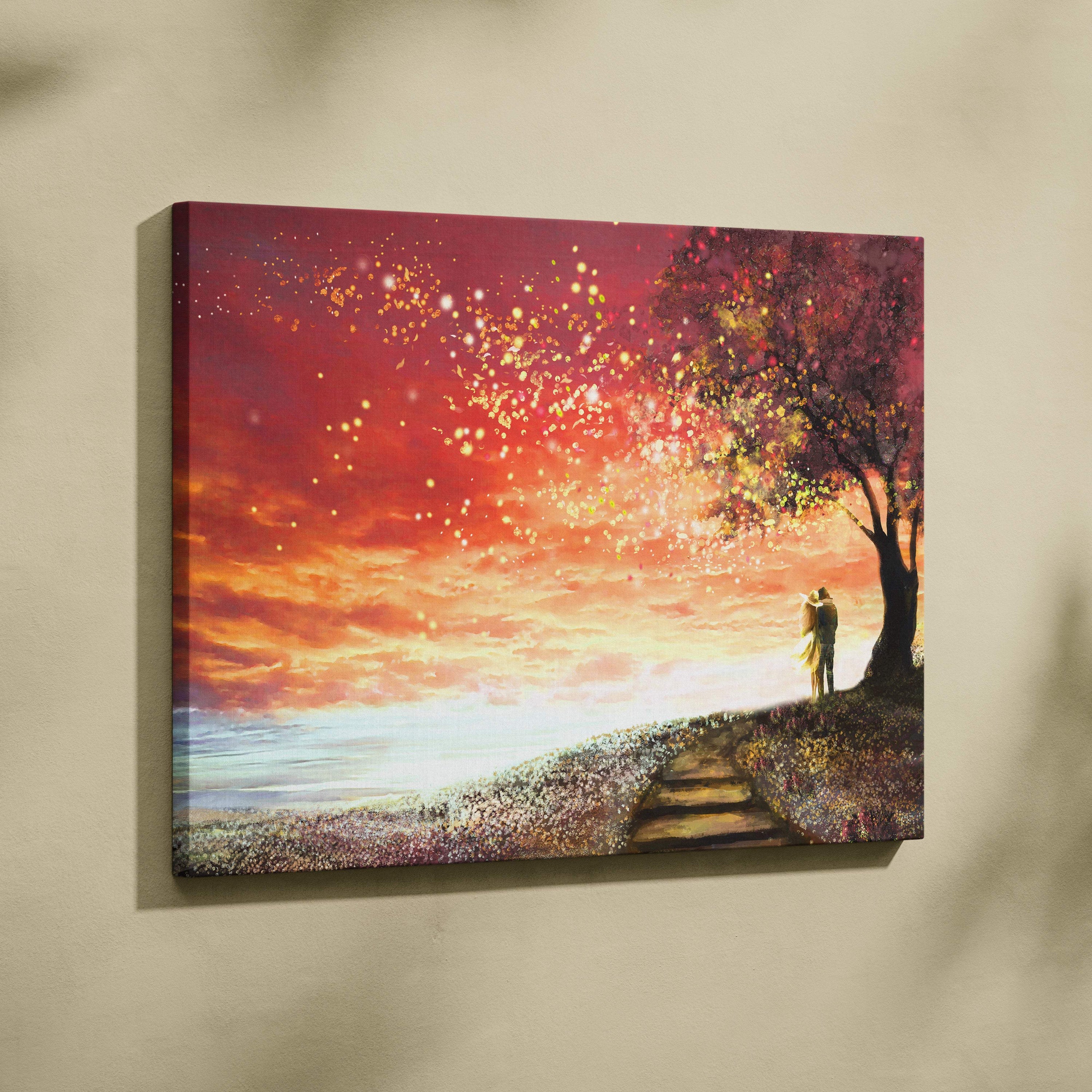 Romantic sunset couple canvas print with glowing sky, blossoming tree, fireflies, and vibrant orange pink hues